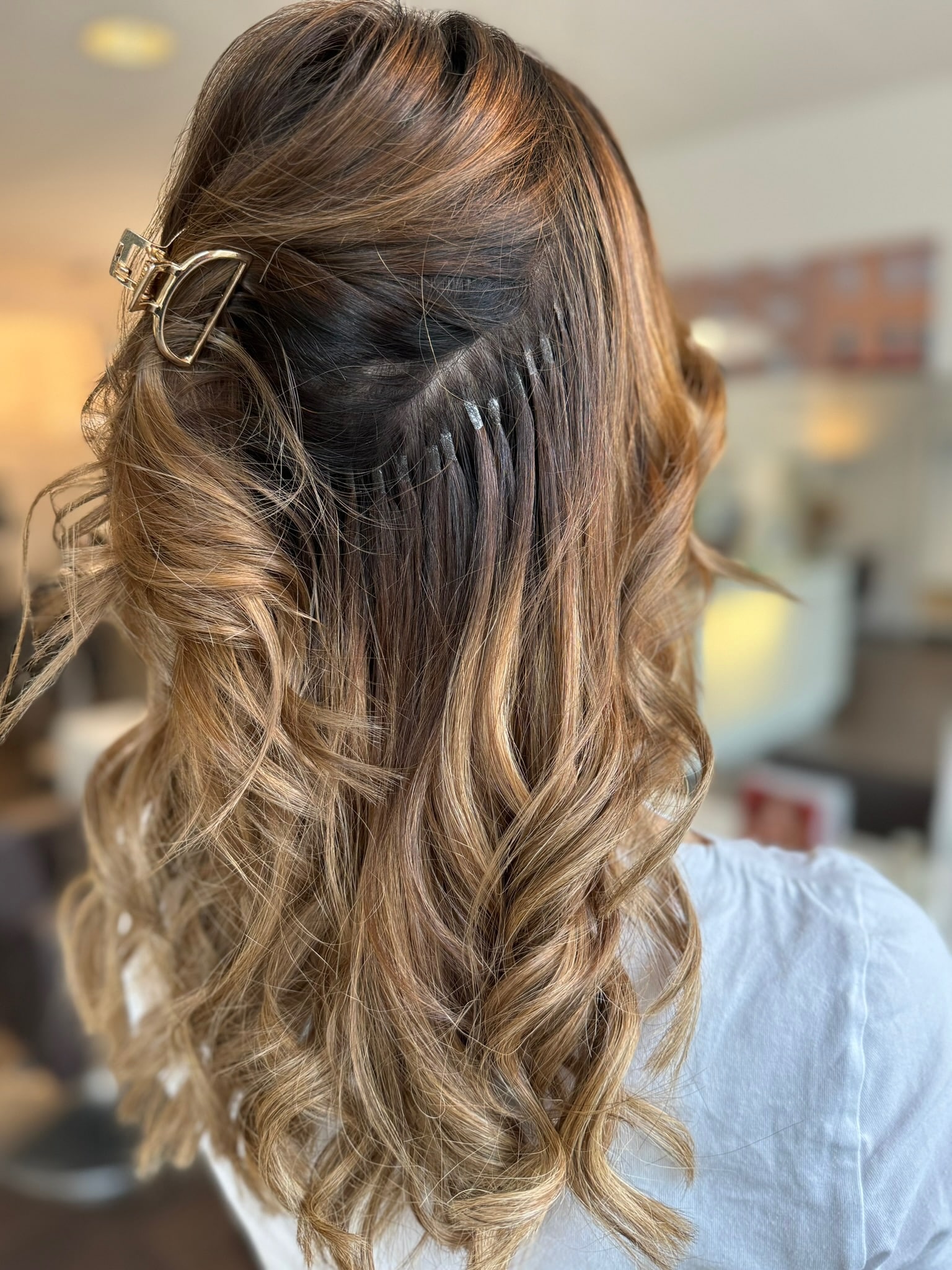 Haarverlängerung mit Locken bei Helena Conzen Hairdesign in Bochum